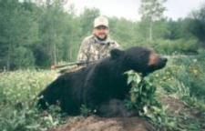 Rick with his bow and a trophy